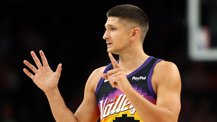 Mar 28, 2026; Phoenix, Arizona, USA; Phoenix Suns guard Grayson Allen (8) against the Utah Jazz in the first half at Mortgage Matchup Center. Mandatory Credit: Mark J. Rebilas-Imagn Images