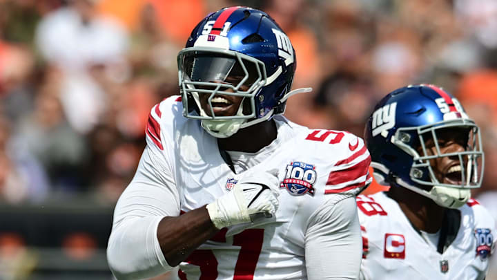 Sep 22, 2024; Cleveland, Ohio, USA; New York Giants linebacker Bobby Okereke (58) and New York Giants linebacker Azeez Ojulari (51) celebrate after a sack during the first quarter against the Cleveland Browns at Huntington Bank Field. Mandatory Credit: Ken Blaze-Imagn Images