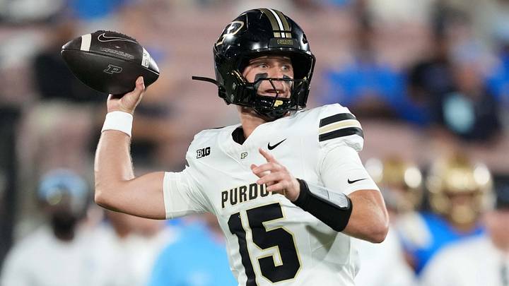 Purdue Boilermakers quarterback Ryan Browne (15) throws a 75-yard touchdown pass against the UCLA Bruins Purdue Boilermakers quarterback Ryan Browne (15) throws a 75-yard touchdown pass against the UCLA Bruins