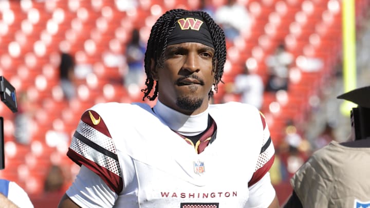 Sep 7, 2025; Landover, Maryland, USA; Washington Commanders quarterback Jayden Daniels (5) walks off the field after the game against the New York Giants at Northwest Stadium. Mandatory Credit: Amber Searls-Imagn Images