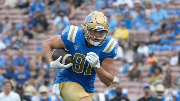 Sep 10, 2022; Pasadena, California, USA; UCLA Bruins tight end Hudson Habermehl (81) carries the ball on a touchdown reception against the Alabama State Hornets in the first half at Rose Bowl. Mandatory Credit: Kirby Lee-Imagn Images Sep 10, 2022; Pasadena, California, USA; UCLA Bruins tight end Hudson Habermehl (81) carries the ball on a touchdown reception against the Alabama State Hornets in the first half at Rose Bowl. Mandatory Credit: Kirby Lee-Imagn Images