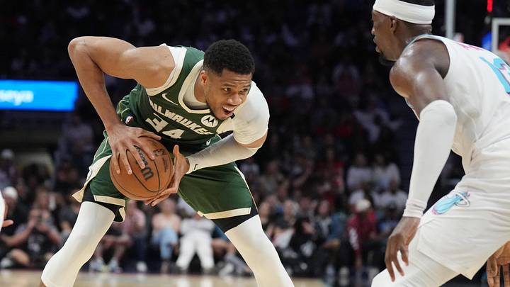 Apr 5, 2025; Miami, Florida, USA; Milwaukee Bucks forward Giannis Antetokounmpo (34) looks to pass the ball as Miami Heat center Bam Adebayo (13) defends during the second half at Kaseya Center. Mandatory Credit: Jim Rassol-Imagn Images Apr 5, 2025; Miami, Florida, USA; Milwaukee Bucks forward Giannis Antetokounmpo (34) looks to pass the ball as Miami Heat center Bam Adebayo (13) defends during the second half at Kaseya Center. Mandatory Credit: Jim Rassol-Imagn Images