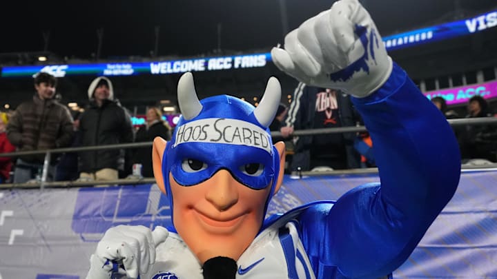 Dec 6, 2025; Charlotte, NC, USA; Duke Blue Devils mascot cheers during overtime against the Virginia Cavaliers during the 2025 ACC Championship game at Bank of America Stadium. Mandatory Credit: Bob Donnan-Imagn Images