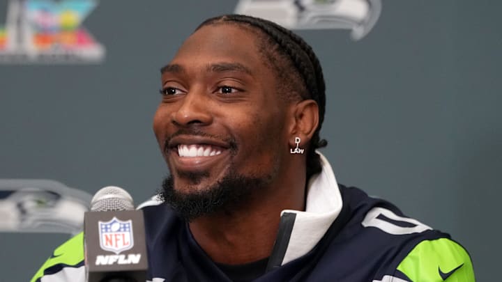 Seattle Seahawks defensive end DeMarcus Lawrence talks to the media