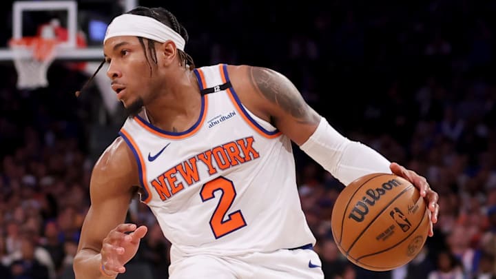 New York Knicks guard Miles McBride controls the ball against Indiana Pacers guard Bennedict Mathurin. Mandatory Credit: Brad Penner-Imagn Images