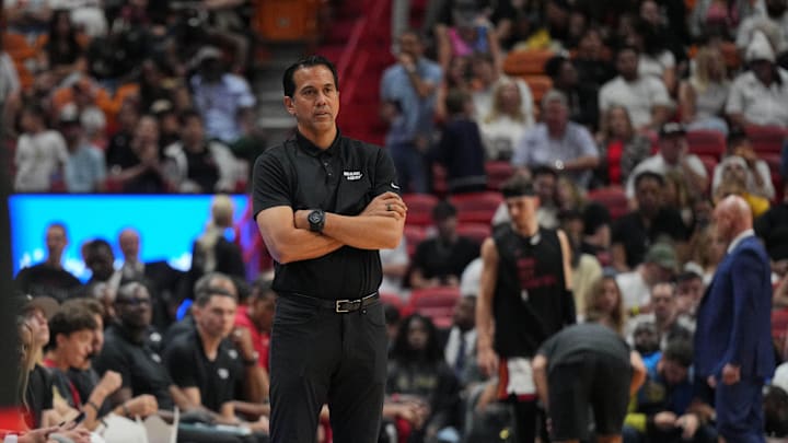 Apr 14, 2024; Miami, Florida, USA;  Miami Heat head coach Erik Spoelstra keeps an eye on his team during the first half against the Toronto Raptors at Kaseya Center. Mandatory Credit: Jim Rassol-Imagn Images