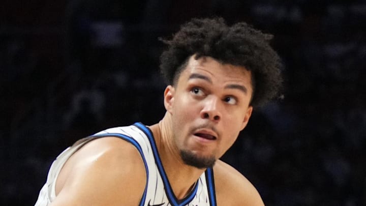 Orlando Magic forward Noah Penda drives to the basket past Miami Heat guard Norman Powell. Orlando Magic forward Noah Penda drives to the basket past Miami Heat guard Norman Powell.