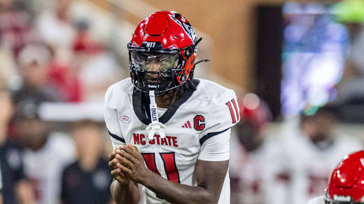 Sep 11, 2025; Winston-Salem, North Carolina, USA;  North Carolina State Wolfpack quarterback CJ Bailey (11) awaits a snap in first half against the Wake Forest Demon Deacons at Allegacy Federal Credit Union Stadium. Mandatory Credit: Luke Jamroz-Imagn Images