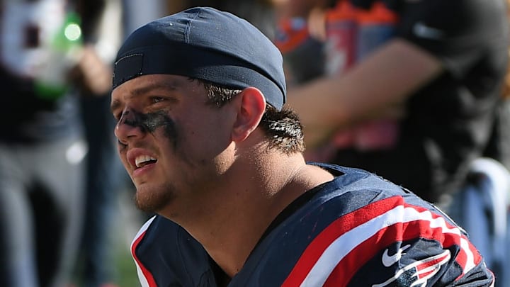Sep 28, 2025; Foxborough, Massachusetts, USA; New England Patriots offensive tackle Will Campbell (66) talks to a teammate during the second half against the Carolina Panthers at Gillette Stadium. Mandatory Credit: Bob DeChiara-Imagn Images