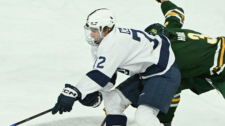 Oct 10, 2025; University Park, PA, USA; Penn State Nittany Lions forward Gavin McKenna (72) skates past Clarkson Golden Knights defenseman Noah Houle (3) during the third period at Pegula Ice Arena. Mandatory Credit: Barry Reeger-Imagn Images