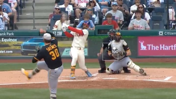 Pittsburgh Pirates pitcher Paul Skenes strikes out Bryce Harper with a 100 mph fastball. 