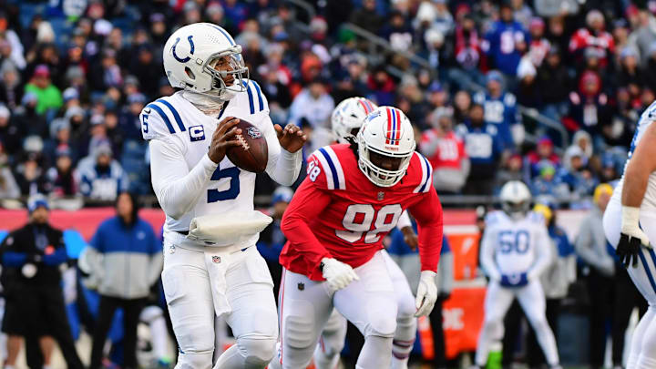 Dec 1, 2024; Foxborough, Massachusetts, USA; Indianapolis Colts quarterback Anthony Richardson (5) looks to throw the ball during the first half against the New England Patriots at Gillette Stadium. Mandatory Credit: Bob DeChiara-Imagn Images