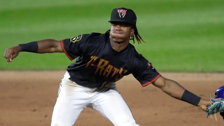 Wisconsin Timber Rattlers' Jesus Made (12) tags out Quad Cities River Bandits' Eridk Torres (4) at second base during their baseball game Wednesday, August 27, 2025, at Neuroscience Group Field at Fox Cities Stadium in Grand Chute, Wisconsin. Quad City won 9-5.