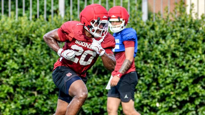 Oklahoma running back Jonathan Hatton Jr. rushes during practice. Oklahoma running back Jonathan Hatton Jr. rushes during practice.