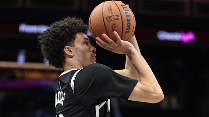 Apr 5, 2026; Brooklyn, New York, USA; Brooklyn Nets guard Nolan Traore (88) shoots the ball during the second half against the Washington Wizards at Barclays Center. Mandatory Credit: Vincent Carchietta-Imagn Images