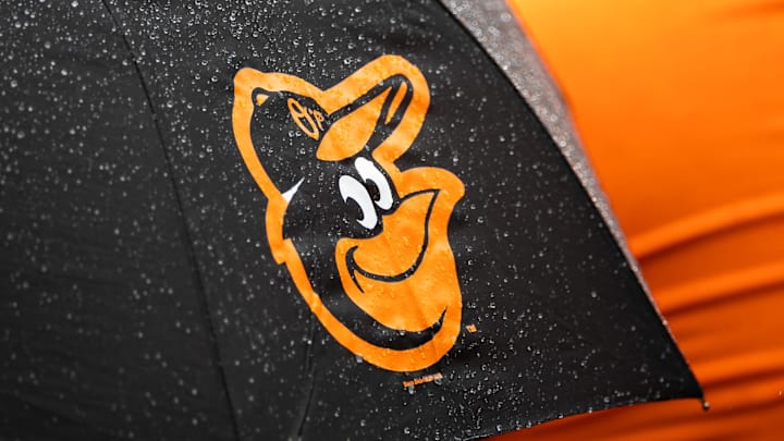 Aug 22, 2021; Baltimore, Maryland, USA; A Baltimore Orioles logo is seen on an umbrella during the game between the Baltimore Orioles and the Atlanta Braves at Oriole Park at Camden Yards. Mandatory Credit: Scott Taetsch-Imagn Images