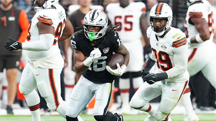 Sep 29, 2024; Paradise, Nevada, USA; Las Vegas Raiders wide receiver Jakobi Meyers (16) gains yardage against the Cleveland Browns during the fourth quarter at Allegiant Stadium. Mandatory Credit: Stephen R. Sylvanie-Imagn Images