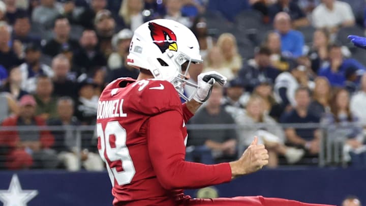 Nov 3, 2025; Arlington, Texas, USA; Dallas Cowboys defensive end Sam Williams (54) blocks a punt by Arizona Cardinals punter Pat O'Donnell (39) in the first half at AT&T Stadium. Mandatory Credit: Kevin Jairaj-Imagn Images