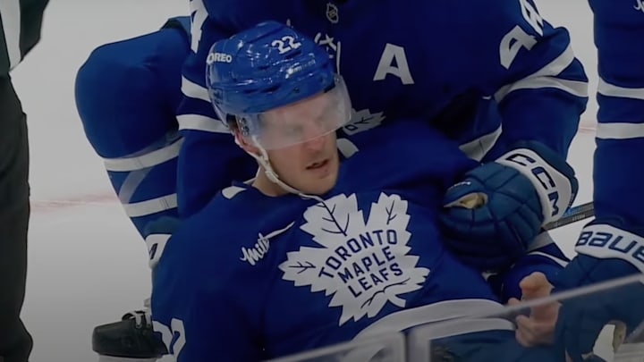 Jake McCabe was shaken up after hitting his head on the ice. 