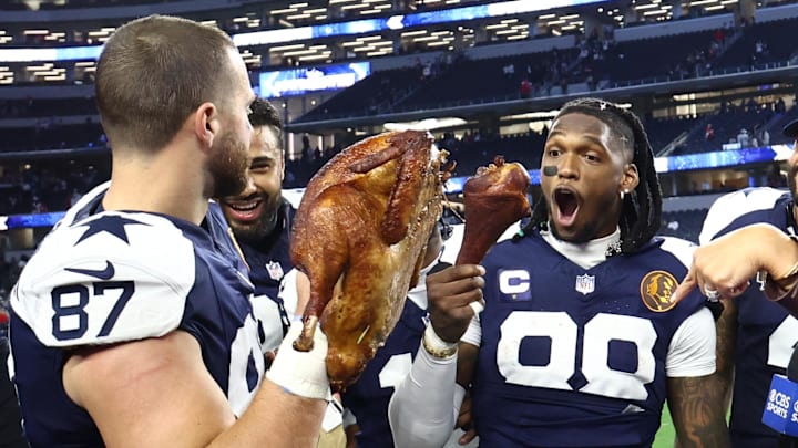 Dallas Cowboys tight end Jake Ferguson and wide receiver CeeDee Lamb celebrate beating the Kansas City Chiefs 