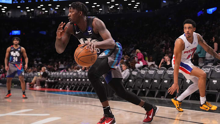 Apr 6, 2024; Brooklyn, New York, USA; Brooklyn Nets power forward Dorian Finney-Smith (28) dribbles the ball against the Detroit Pistons during the second half at Barclays Center. Mandatory Credit: Gregory Fisher-USA TODAY Sports