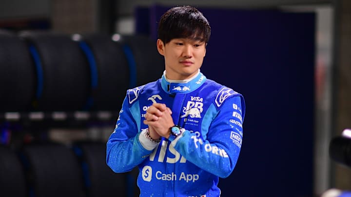 Nov 20, 2024; Las Vegas, Nevada, USA; Visa Cash App RB driver Yuki Tsunoda (22) poses for photos at Las Vegas Circuit. Mandatory Credit: Gary A. Vasquez-Imagn Images
