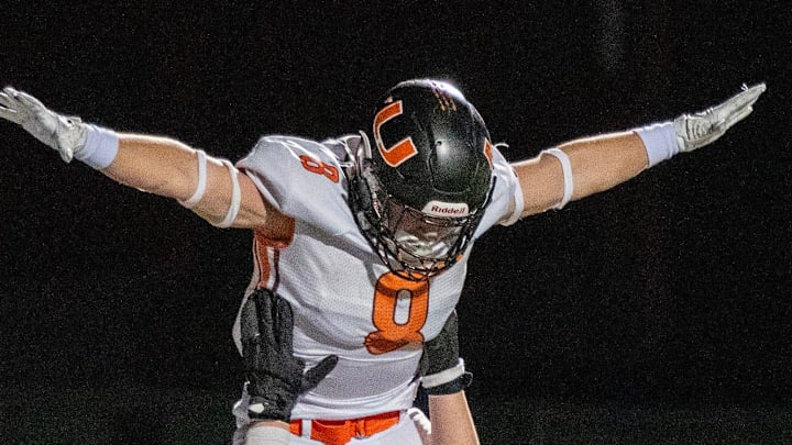 Uxbridge running back Camden LaChapelle celebrates a touchdown during the 2024 season.