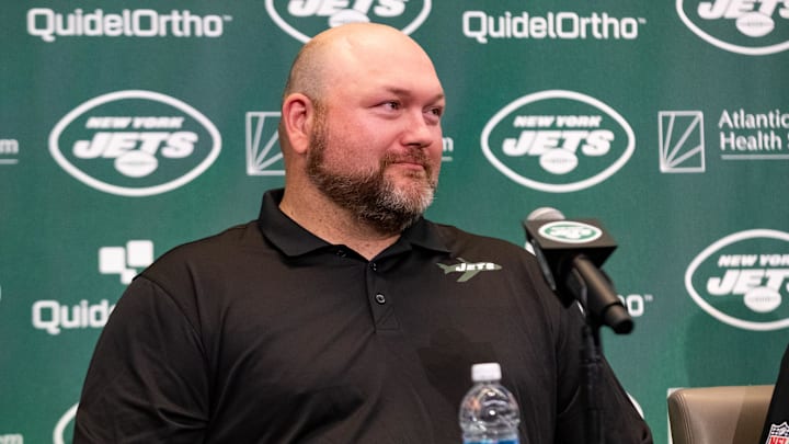 Douglas addresses the media during the introductory press conference for Aaron Rodgers in 2023