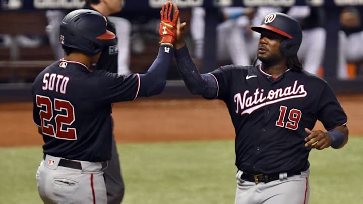 Sep 20, 2021; Miami, Florida, USA; Washington Nationals left fielder Josh Bell (19) and right fielder Juan Soto (22) celebrate each scoring a run during the fifth inning against the Miami Marlins at loanDepot Park Sep 20, 2021; Miami, Florida, USA; Washington Nationals left fielder Josh Bell (19) and right fielder Juan Soto (22) celebrate each scoring a run during the fifth inning against the Miami Marlins at loanDepot Park