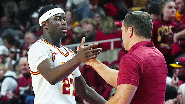 Iowa State Cyclones forward Killyan Toure (27) gets congratulation from men's basketball head coach T.J. Otzelberger during the second half against UCF in the Big-12 conference game on Jan. 20, 2026, at Hilton Coliseum in Ames, Iowa.