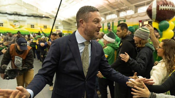 Oregon coach Dan Lanning greets fans at the Moshofsky Sports Center before the College Football Playoff game between Oregon and James Madison Dec. 20, 2025.
