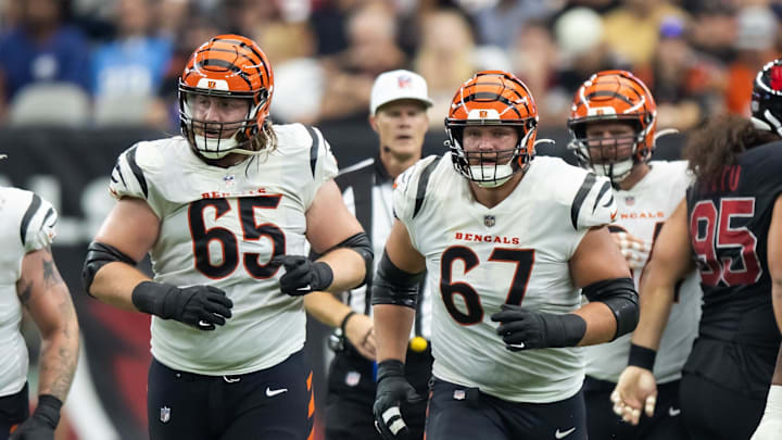 Oct 8, 2023; Glendale, Arizona, USA; Cincinnati Bengals guard Alex Cappa (65), guard Cordell Volson (67) and offensive tackle Orlando Brown Jr. (75) against the Arizona Cardinals at State Farm Stadium. Mandatory Credit: Mark J. Rebilas-Imagn Images