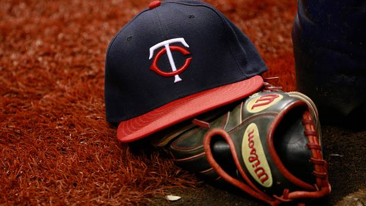 Aug 25, 2015; St. Petersburg, FL, USA; Minnesota Twins hat and glove lays on the field during the game against the Tampa Bay Rays at Tropicana Field. Mandatory Credit: Kim Klement-USA TODAY Sports Aug 25, 2015; St. Petersburg, FL, USA; Minnesota Twins hat and glove lays on the field during the game against the Tampa Bay Rays at Tropicana Field. Mandatory Credit: Kim Klement-USA TODAY Sports