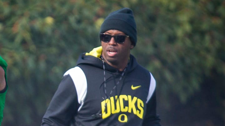 New co-defensive coordinator and safeties coach Chris Hampton, right, joins the first practice of spring for Oregon football as they prepare for the 2023 season.

Eug 031623 Uo Spring Fb 06