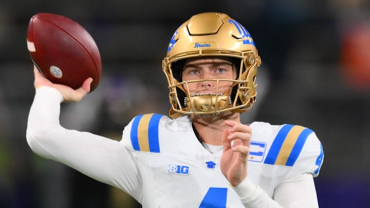 Nov 15, 2024; Seattle, Washington, USA; UCLA Bruins quarterback Ethan Garbers (4) throws the ball during warmups before the game against the Washington Huskies at Alaska Airlines Field at Husky Stadium. Mandatory Credit: Steven Bisig-Imagn Images