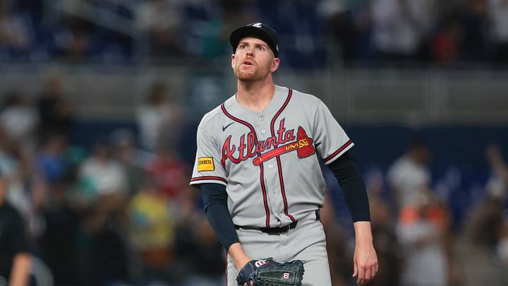 May 18, 2026; Miami, Florida, USA; Atlanta Braves pitcher Aaron Bummer (49) reacts after allowing a son home run against Miami Marlins second baseman Xavier Edwards (9) during the fifth inning at loanDepot Park. Mandatory Credit: Sam Navarro-Imagn Images