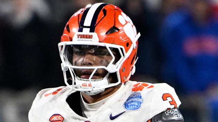 Dec 7, 2024; Charlotte, NC, USA; Clemson Tigers defensive end T.J. Parker (3) celebrates with linebacker Wade Woodaz (17) after a play during the second quarter against the Southern Methodist Mustangs in the 2024 ACC Championship game at Bank of America Stadium. Mandatory Credit: Bob Donnan-Imagn Images