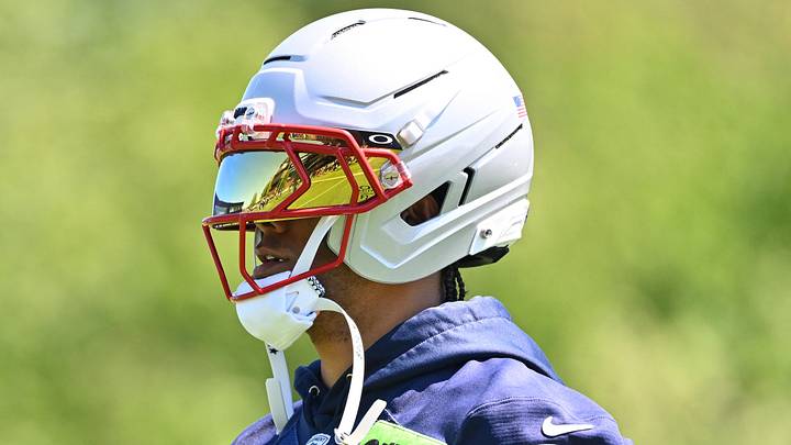 Jun 9, 2026; Foxborough, MA, USA; New England Patriots cornerback Christian Gonzalez (0) looks on during minicamp at Gillette Stadium. Mandatory Credit: Eric Canha-Imagn Images