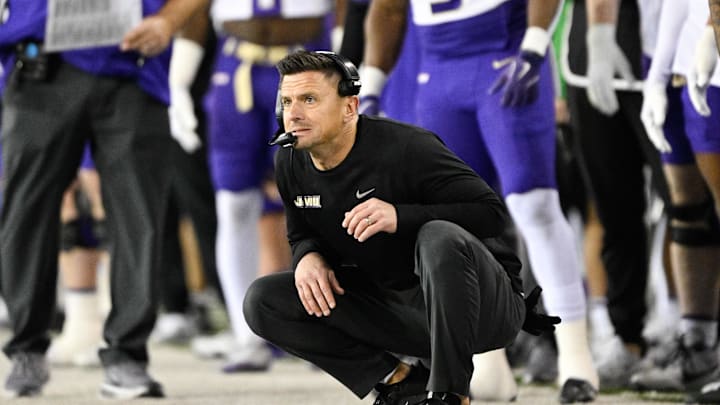 Dec 20, 2025; Eugene, OR, USA;  James Madison Dukes head coach Bob Chesney looks on during the first quarter against the Oregon Ducks at Autzen Stadium. Mandatory Credit: Troy Wayrynen-Imagn Images