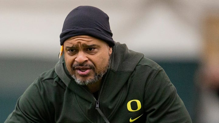 Oregon cornerbacks coach Demetrice Martin works with players April 14, 2022, during practice in Eugene, Ore.