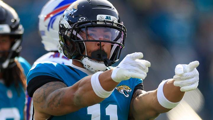 Jacksonville Jaguars wide receiver Parker Washington (11) celebrates his first down pickup during the third quarter of an NFL football AFC Wild Card playoff matchup, Sunday, Jan. 11, 2026, in Jacksonville, Fla. The Bills defeated the Jaguars 27-24. [Corey Perrine/Florida Times-Union]