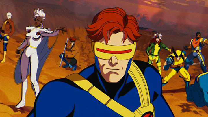 (L-R): Morph (voiced by JP Karliak), Storm (voiced by Alison Sealy-Smith), Gambit (voiced by AJ LoCascio), Cyclops (voiced by Ray Chase), Rogue (voiced by Lenore Zann), Wolverine (voiced by Cal Dodd), Bishop (voiced by Isaac Robinson-Smith), Beast (voiced by George Buza) in Marvel Animation's X-MEN '97. Photo courtesy of Marvel Animation. © 2024 MARVEL.