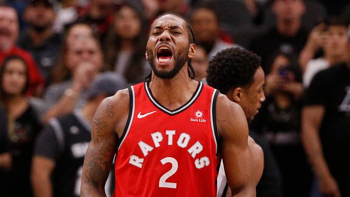 San Antonio, TX, USA; Toronto Raptors small forward Kawhi Leonard (2) reacts after drawing a foul after scoring a basket against the San Antonio Spurs during the first half at AT&T Center on January 3, 2019.
