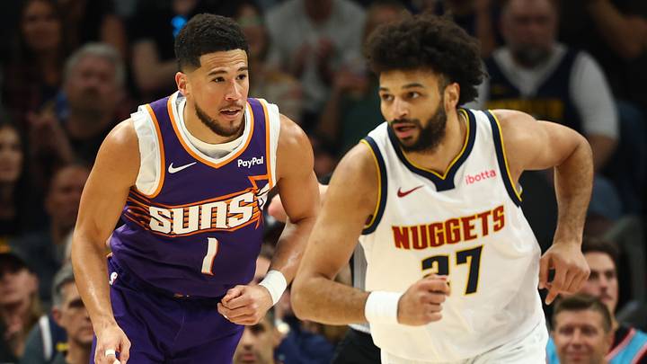 Mar 24, 2026; Phoenix, Arizona, USA; Phoenix Suns guard Devin Booker (1) against Denver Nuggets guard Jamal Murray (27) at Mortgage Matchup Center. Mandatory Credit: Mark J. Rebilas-Imagn Images Mar 24, 2026; Phoenix, Arizona, USA; Phoenix Suns guard Devin Booker (1) against Denver Nuggets guard Jamal Murray (27) at Mortgage Matchup Center. Mandatory Credit: Mark J. Rebilas-Imagn Images