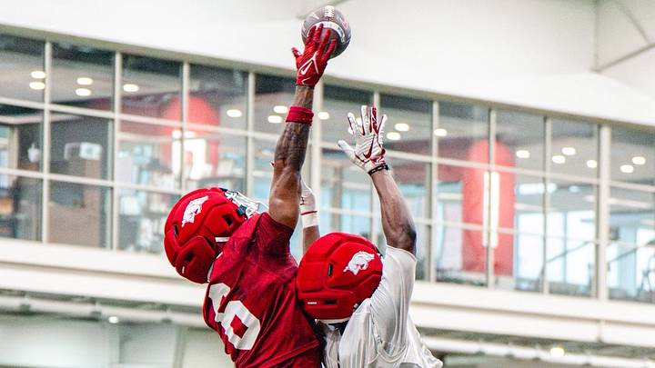Arkansas Razorbacks defensive back Khmori House makes one handed interception during spring practice. Arkansas Razorbacks defensive back Khmori House makes one handed interception during spring practice.