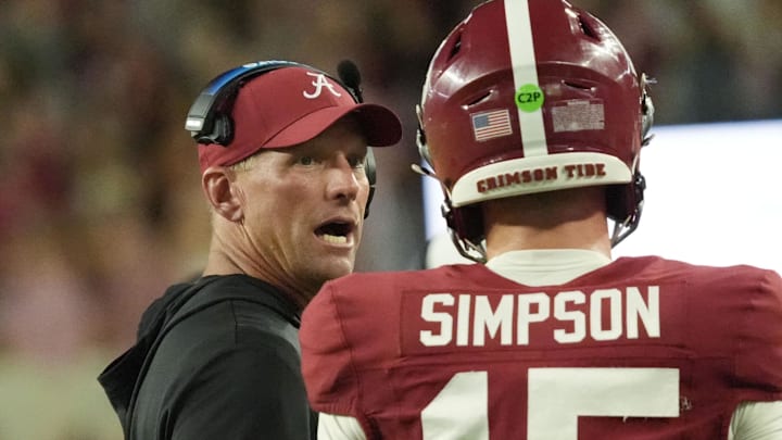 Sep 6, 2025; Tuscaloosa, Alabama, USA;  Alabama head coach Kalen DeBoer talks to Alabama quarterback Ty Simpson (15) as Simpson comes off the field after a touchdown drive against UL Monroe at Saban Field at Bryant-Denny Stadium. Mandatory Credit: Gary Cosby Jr.-Imagn Images