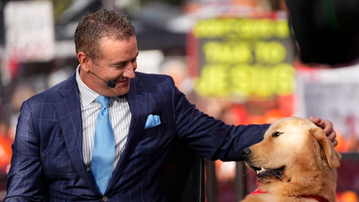 Kirk Herbstreit pets his dog, Peter, on the set of ESPN College GameDay prior to the NCAA football game between the Ohio State Buckeyes and the Texas Longhorns at Ohio Stadium on Aug. 30, 2025.