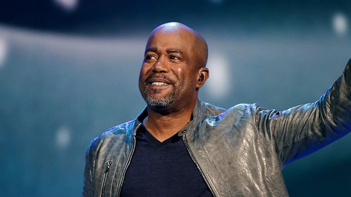 Darius Rucker waves after finishing a song during the taping of the annual CMA Country Christmas at the Grand Ole Opry House on Nov. 7, 2015.