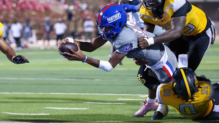 Duncanville QB Keelon Russell, a 5-star Alabama commit, dives into the endzone for a TD in a win over St. Frances Academy on Sept. 14, 2024.