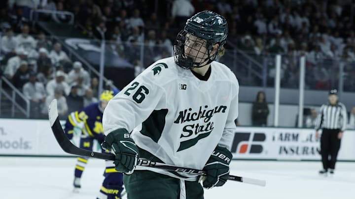 Michigan State Spartans center Eric Nilson looks towards a teammate before a faceoff against the Michigan Wolverines on Friday, Dec. 5, 2025, at Munn Ice Arena. Michigan State Spartans center Eric Nilson looks towards a teammate before a faceoff against the Michigan Wolverines on Friday, Dec. 5, 2025, at Munn Ice Arena.